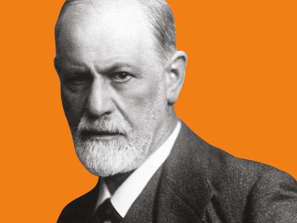 Black and white cutout photograph of Sigmund Freud set against an orange background.