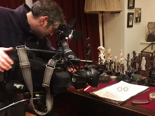 Camera crew filming Freud's desk. Location Hire.