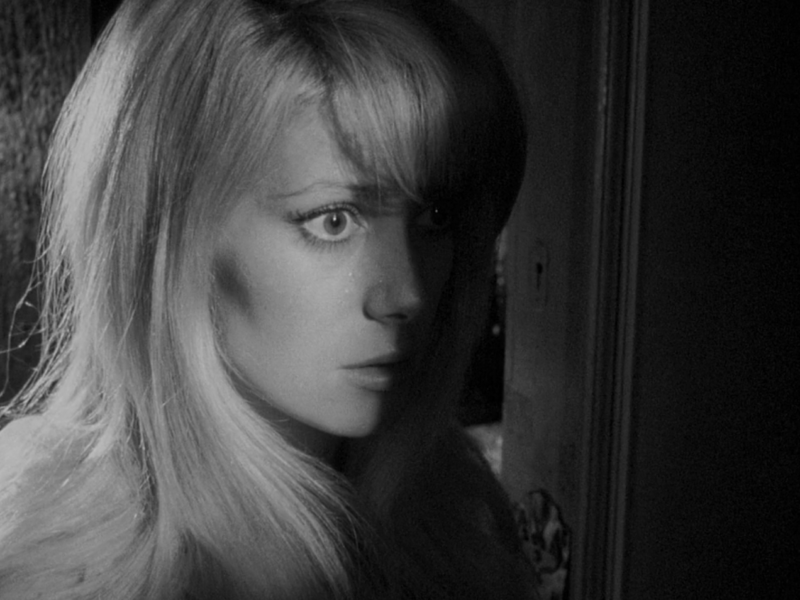 Catherine Deneuve in Repulsion film Roman Polanski, uncanny, woman's face is submerged in shadow