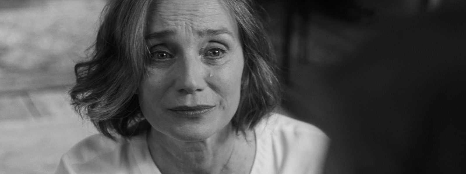 kristin scott thomas in the party - black and white image.