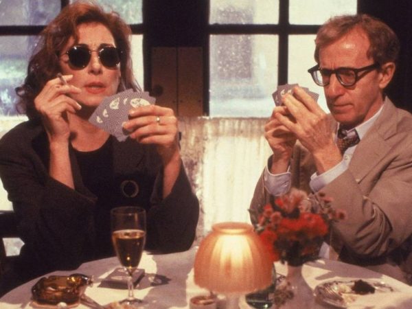 woody allen and angelica houston playing cards