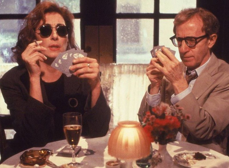 woody allen and angelica houston playing cards