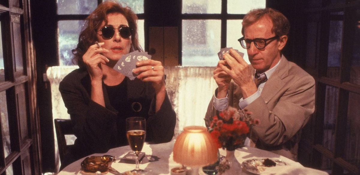 woody allen and angelica houston playing cards