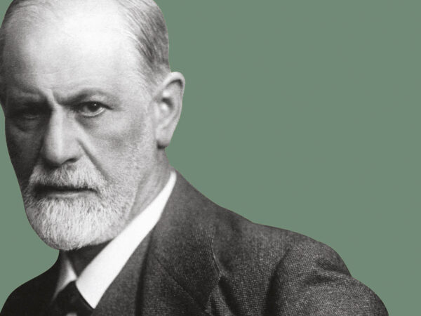 Freud against a dark green background