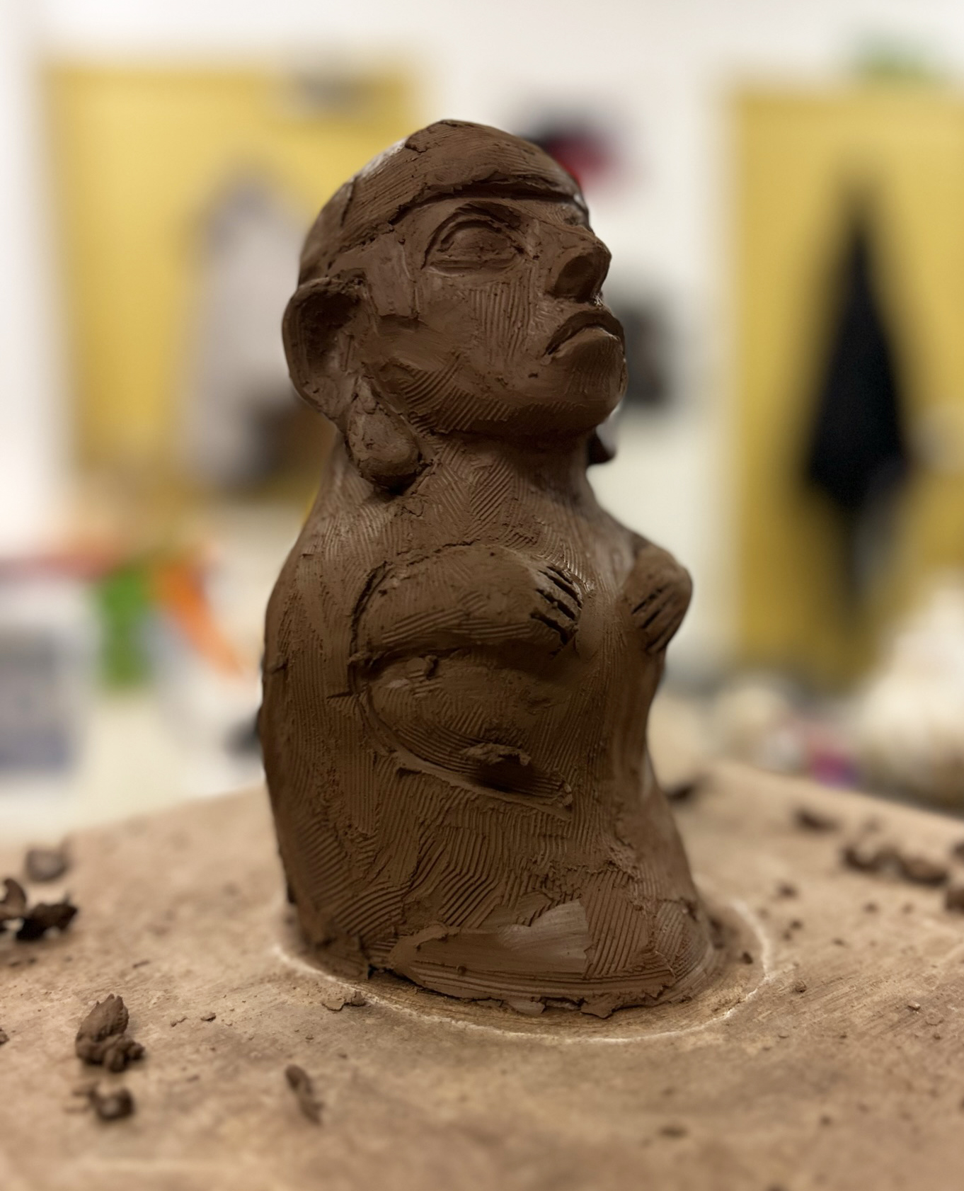 Sculpting the Peruvian Vessel Replica. Photo by Martha
